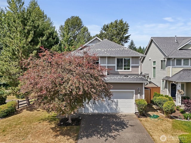 16922 SE 262nd St, Covington, WA 98042 - view of front of property with a garage, driveway, board and batten siding, and a shingled roof