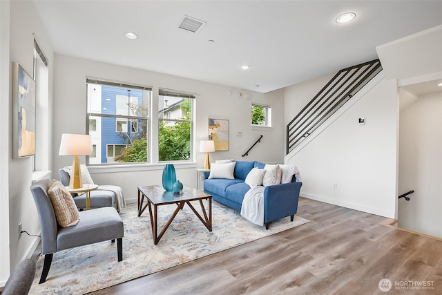 1214 N Northgate Way, Seattle, WA 98133 - living area with stairway, wood finished floors, and recessed lighting