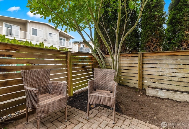 1214 N Northgate Way, Seattle, WA 98133 - fenced backyard featuring a patio area