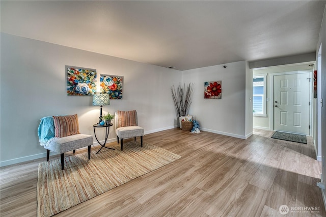 3939 10th St SE Unit C6, Puyallup, WA 98374 - living area with light wood-style floors and baseboards