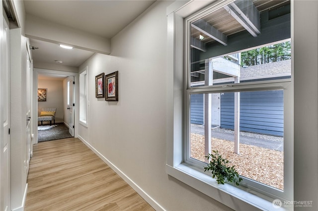 3939 10th St SE Unit C6, Puyallup, WA 98374 - hall featuring wood finished floors and baseboards
