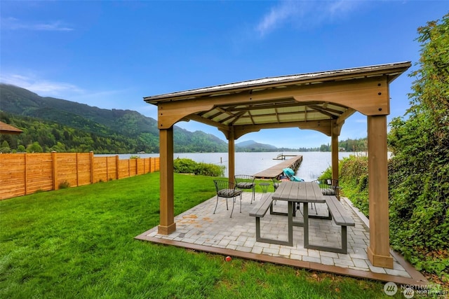 921 Autumn Ln Unit 221, Bellingham, WA 98229 - fenced backyard featuring a gazebo, a water and mountain view, and a patio area