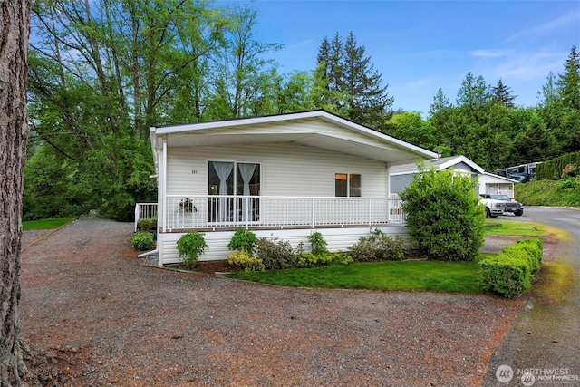 921 Autumn Ln Unit 221, Bellingham, WA 98229 - manufactured / mobile home with a porch and driveway