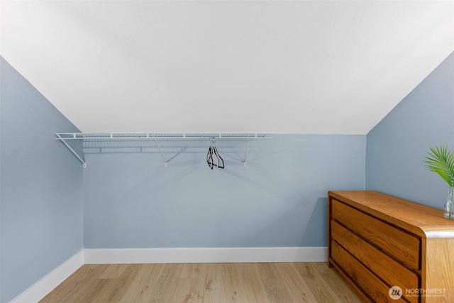 3209 S 8th St, Tacoma, WA 98405 - spacious closet featuring light wood finished floors and vaulted ceiling