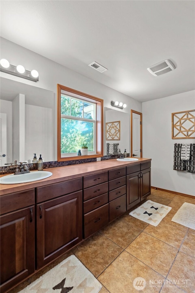 19838 Bear View Ln SW, Rochester, WA 98579 - full bathroom with double vanity and tile patterned floors