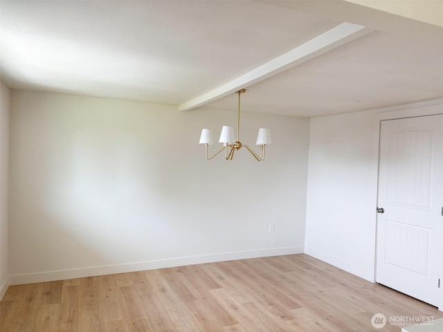 308 N Dale Rd, Moses Lake, WA 98837 - spare room featuring a chandelier and light wood-style flooring