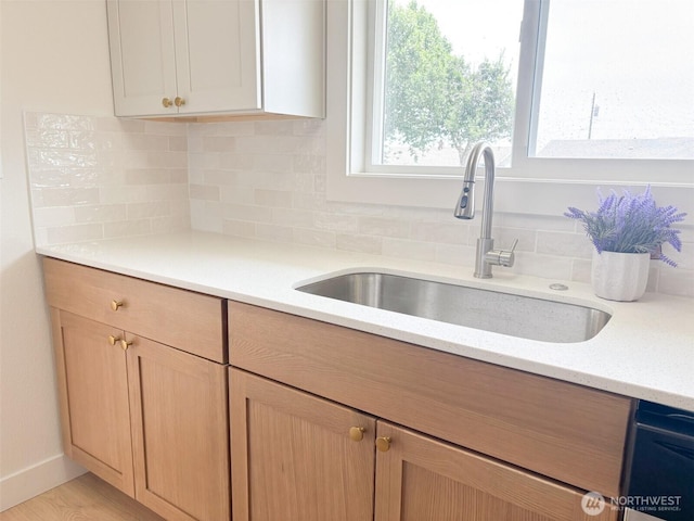 308 N Dale Rd, Moses Lake, WA 98837 - kitchen with a sink and decorative backsplash