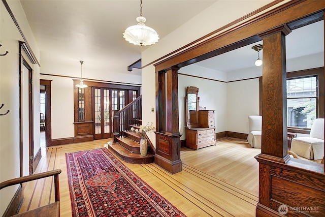 906 E Shelby St, Seattle, WA 98102 - hall with decorative columns and wood finished floors