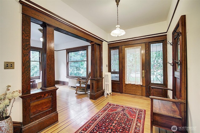 906 E Shelby St, Seattle, WA 98102 - entryway featuring wood finished floors and radiator