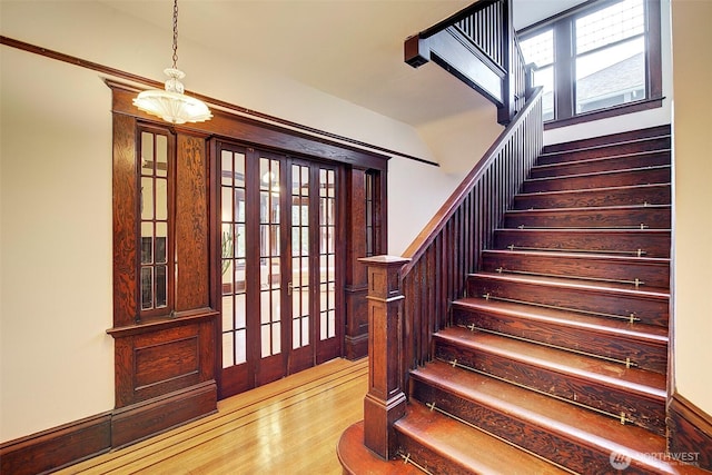 906 E Shelby St, Seattle, WA 98102 - staircase featuring wood finished floors
