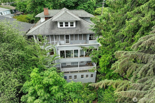 906 E Shelby St, Seattle, WA 98102 - back of property with a balcony, a chimney, and a sunroom