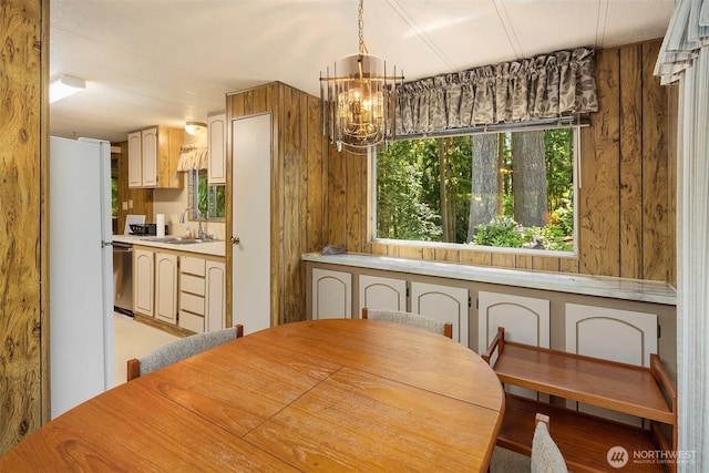 827 211th Pl NE, Sammamish, WA 98074 - dining area with a chandelier and wood walls