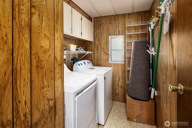 827 211th Pl NE, Sammamish, WA 98074 - washroom featuring cabinet space, washing machine and dryer, and wooden walls