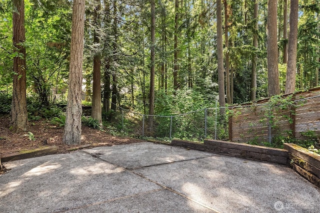 827 211th Pl NE, Sammamish, WA 98074 - view of patio featuring a view of trees
