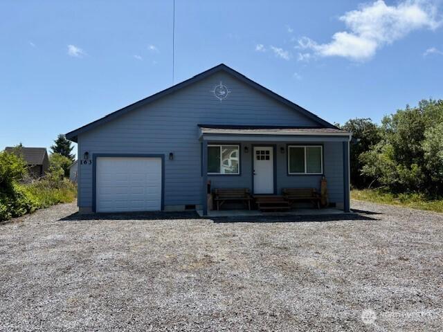 163 Wishkah St SW, Ocean Shores, WA 98569 - view of front facade with an attached garage and covered porch