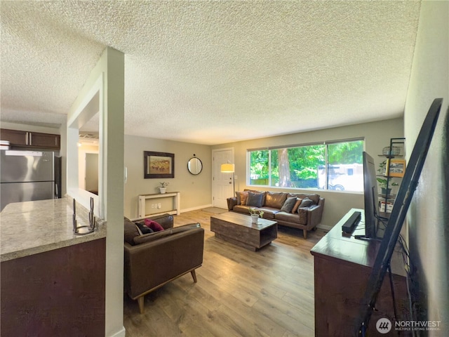 17714 Robinhood Ln, Snohomish, WA 98290 - living area with wood finished floors and a textured ceiling