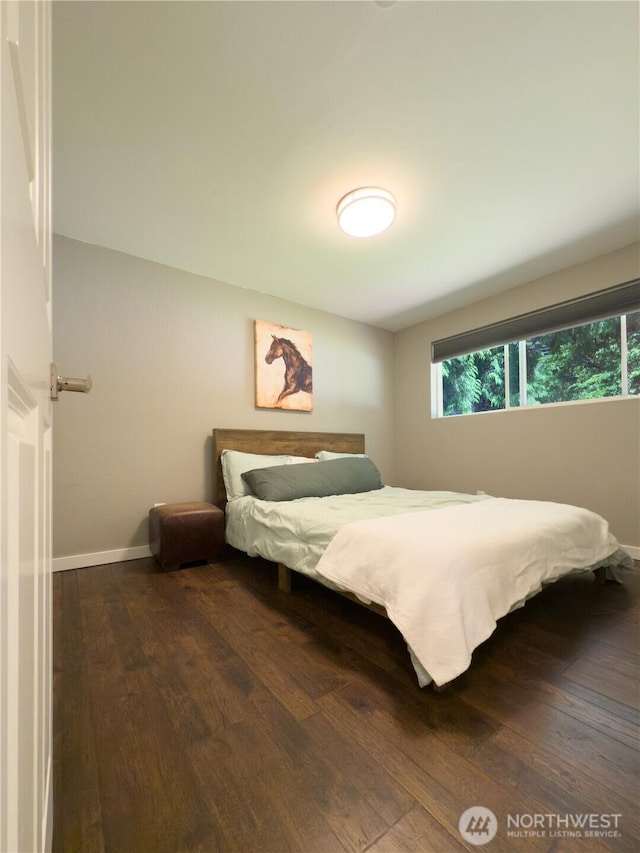 17714 Robinhood Ln, Snohomish, WA 98290 - bedroom featuring wood-type flooring and baseboards