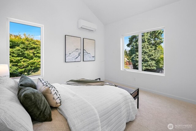 10339 11th Ave NW, Seattle, WA 98177 - carpeted bedroom featuring an AC wall unit and lofted ceiling