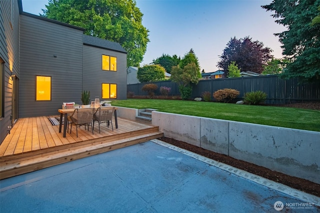 10339 11th Ave NW, Seattle, WA 98177 - deck at dusk featuring a fenced backyard and outdoor dining space
