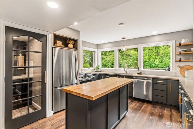 233 Joann Ln, Arlington, WA 98223 - kitchen with wood counters, stainless steel appliances, open shelves, dark wood-style floors, and recessed lighting