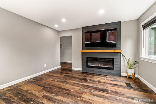 233 Joann Ln, Arlington, WA 98223 - unfurnished living room with a fireplace, wood finished floors, and recessed lighting