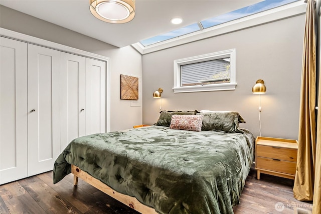 233 Joann Ln, Arlington, WA 98223 - bedroom with wood finished floors, a closet, and a skylight
