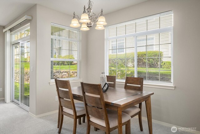 1855 Trossachs Blvd SE Unit 1401, Sammamish, WA 98075 - dining area featuring light carpet and a chandelier