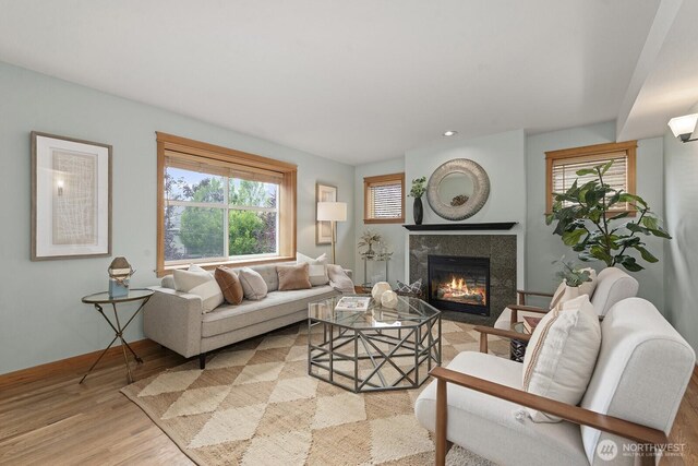 9400 35th Ave SW, Seattle, WA 98126 - living room with a tile fireplace, light wood-style flooring, and recessed lighting