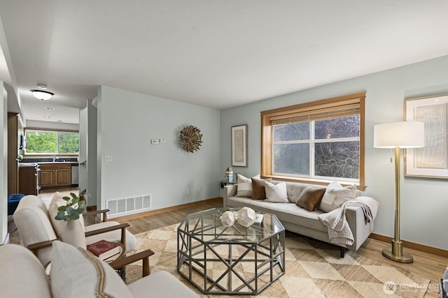 9400 35th Ave SW, Seattle, WA 98126 - living area with light wood-type flooring and baseboards