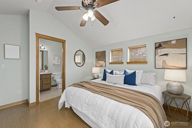 9400 35th Ave SW, Seattle, WA 98126 - bedroom featuring lofted ceiling, light wood-type flooring, ensuite bath, and a ceiling fan