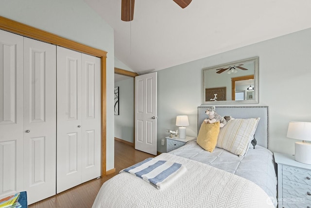 9400 35th Ave SW, Seattle, WA 98126 - bedroom with lofted ceiling, wood finished floors, a closet, and a ceiling fan