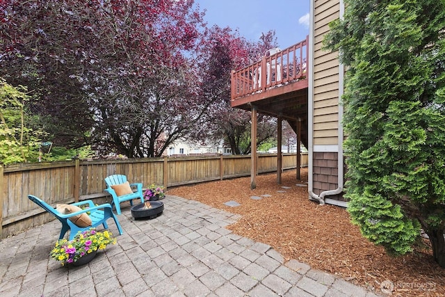 9400 35th Ave SW, Seattle, WA 98126 - fenced backyard featuring a patio and a deck
