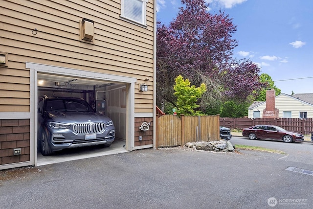 9400 35th Ave SW, Seattle, WA 98126 - garage featuring a garage door opener