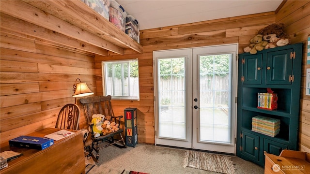 1215 273rd Pl, Ocean Park, WA 98640 - entryway featuring french doors, carpet, and wood walls