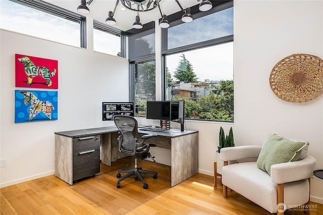 2501 Yale Ave E, Seattle, WA 98102 - office area with light wood-style floors and baseboards