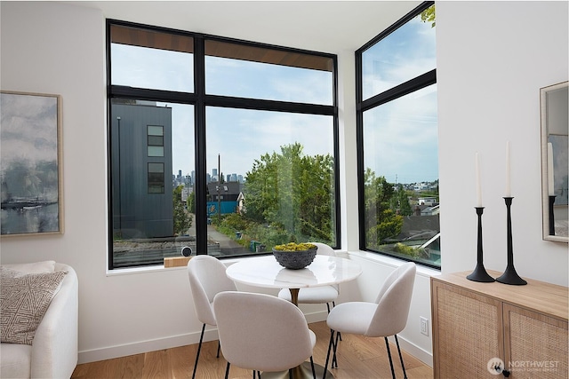 2501 Yale Ave E, Seattle, WA 98102 - dining room with light wood-type flooring and floor to ceiling windows