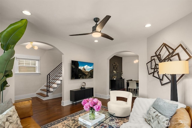 325 23rd Ave E, Seattle, WA 98112 - living room featuring arched walkways, wood finished floors, stairs, a ceiling fan, and recessed lighting