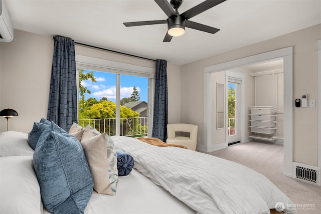 325 23rd Ave E, Seattle, WA 98112 - bedroom with access to exterior, carpet, a ceiling fan, and a wall unit AC