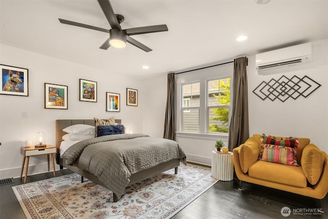 325 23rd Ave E, Seattle, WA 98112 - bedroom featuring an AC wall unit, wood finished floors, recessed lighting, and ceiling fan