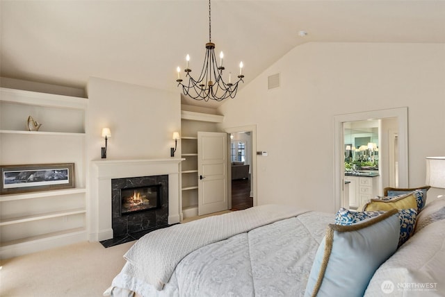 303 39th Ave NE, Olympia, WA 98506 - bedroom with a chandelier, a fireplace, and high vaulted ceiling