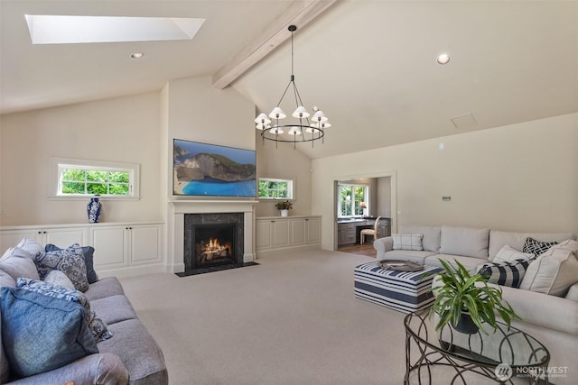 303 39th Ave NE, Olympia, WA 98506 - living room featuring beamed ceiling, carpet flooring, a fireplace with flush hearth, high vaulted ceiling, and a chandelier