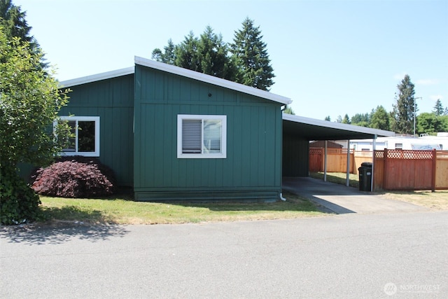 5705 Littlerock Rd SW Unit 41, Tumwater, WA 98512 - view of home's exterior featuring a carport and driveway