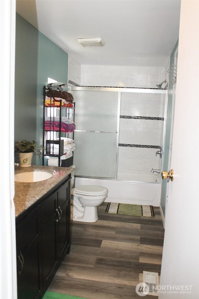 5705 Littlerock Rd SW Unit 41, Tumwater, WA 98512 - full bathroom featuring vanity, wood finished floors, and shower / washtub combination