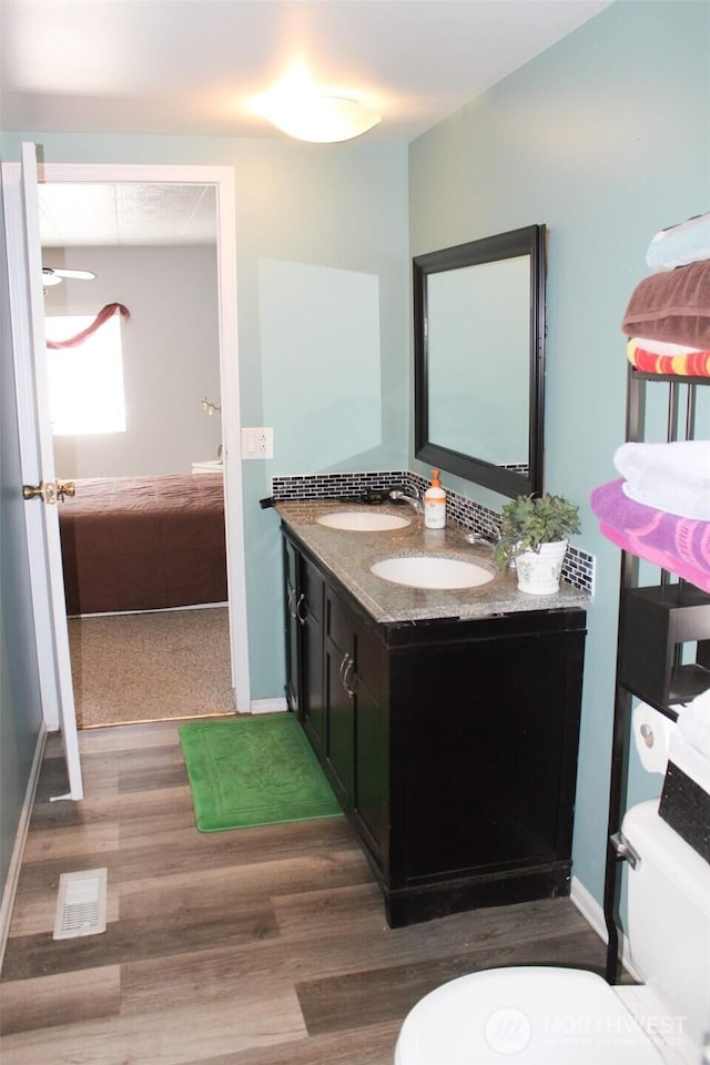 5705 Littlerock Rd SW Unit 41, Tumwater, WA 98512 - bathroom with double vanity and wood finished floors