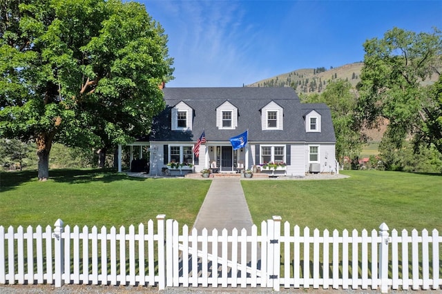 3A Ross Rd, Twisp, WA 98856 - new england style home featuring a fenced front yard and a mountain view