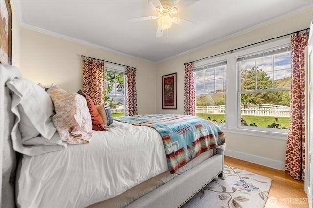 3A Ross Rd, Twisp, WA 98856 - bedroom with crown molding, wood finished floors, and a ceiling fan