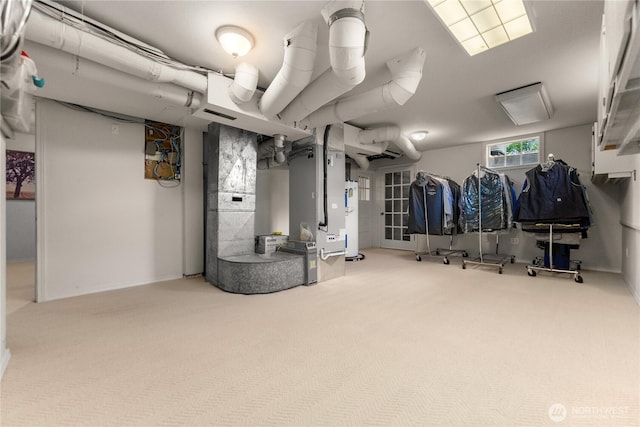3A Ross Rd, Twisp, WA 98856 - basement featuring carpet flooring, heating unit, and electric water heater