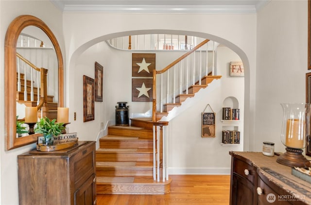3A Ross Rd, Twisp, WA 98856 - stairs with wood finished floors, ornamental molding, and arched walkways