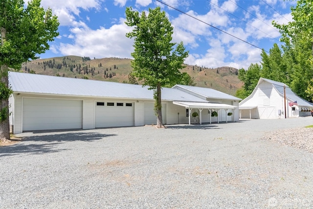 3A Ross Rd, Twisp, WA 98856 - view of front of property featuring a mountain view, a barn, and an outdoor structure