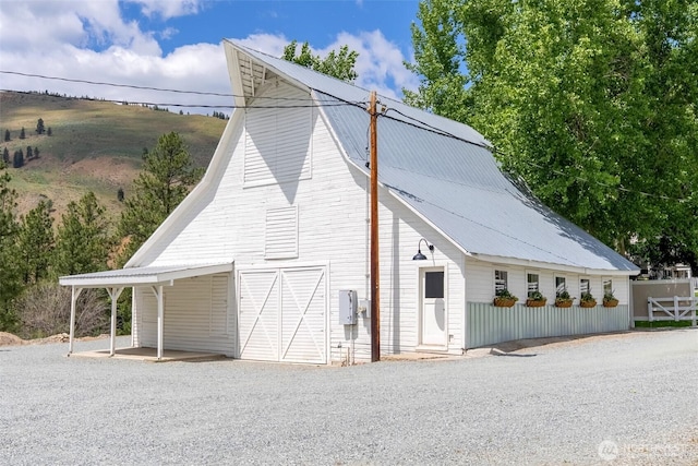 3A Ross Rd, Twisp, WA 98856 - view of home's exterior featuring a barn, an outbuilding, and a metal roof